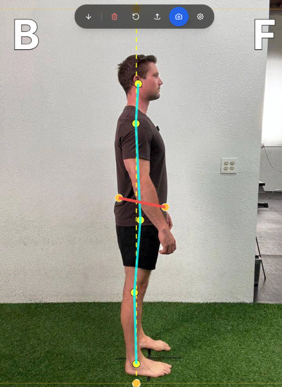 Person taking a posture photo on their phone for a biomechanics assessment
